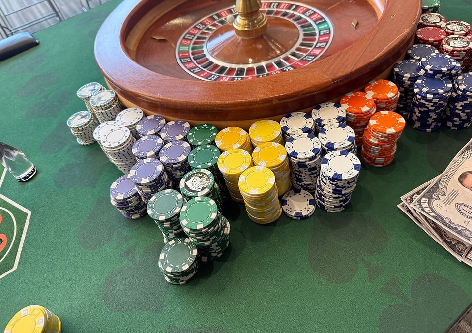 Casino chips on a felt table